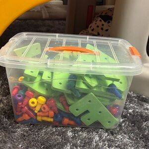 Colorful letters and pegs game